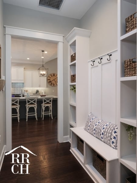 Custom Home Build Longleaf Custom Built-Ins in Mudroom Looking into Kitchen | Robinson Renovation & Custom Homes, Inc.
