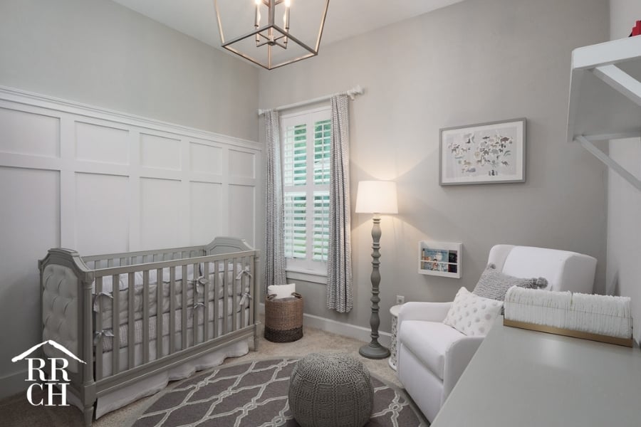 Custom Home Build Longleaf Nursery with Modern Farmhouse Lighting and Trim Accent Wall | Robinson Renovation & Custom Homes, Inc.