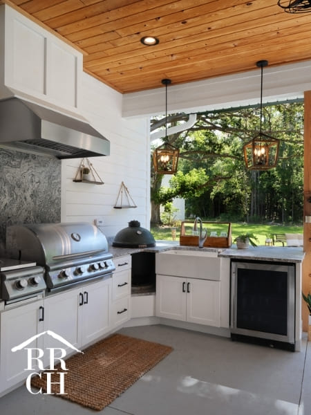 Custom Home Build Outdoor Living Area with Outdoor Kitchen and Wood Ceilings - Dylans Grove 2 | Robinson Renovation & Custom Homes, Inc.