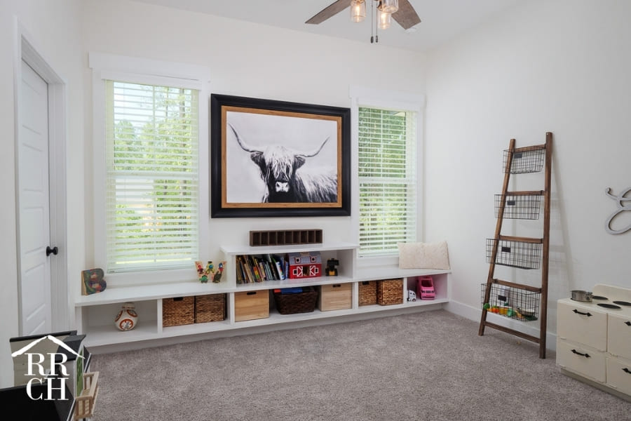 Custom Home Build Playroom with Custom Built-In Window Bench - Dylans Grove 2 | Robinson Renovation & Custom Homes, Inc.