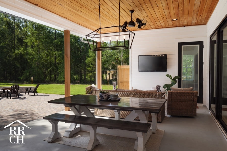 Outdoor Living and Dining Area Shiplap Walls Modern Farmhouse Industrial Lighting Fixture - Dylans Grove 2 | Robinson Renovation & Custom Homes, Inc.