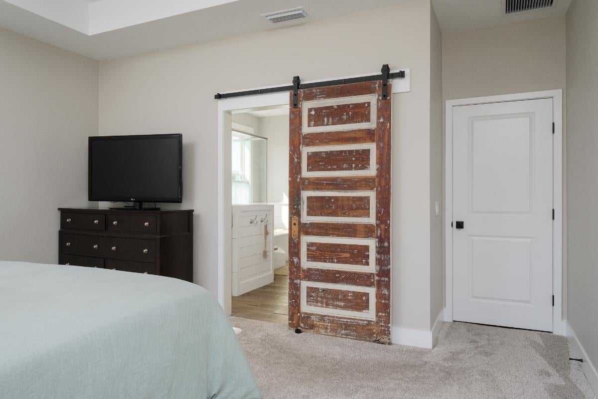 Bedroom with Farmhouse Door 