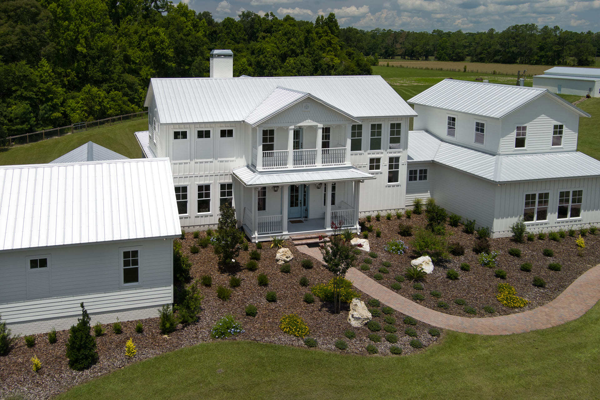 Double Balconies on Front of Custom Farmhouse in Alachua Double Balconies on Front of Custom Farmhouse in Alachua