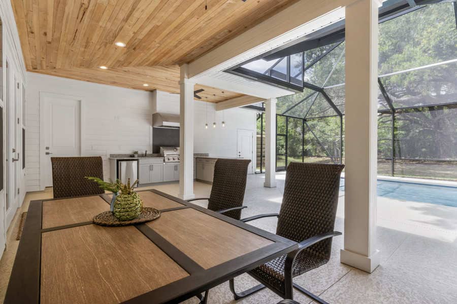 Fletcher Park Lot 5 Backyard Lounge Area of Modern Farmhouse Custom Home in Gainesville, FL