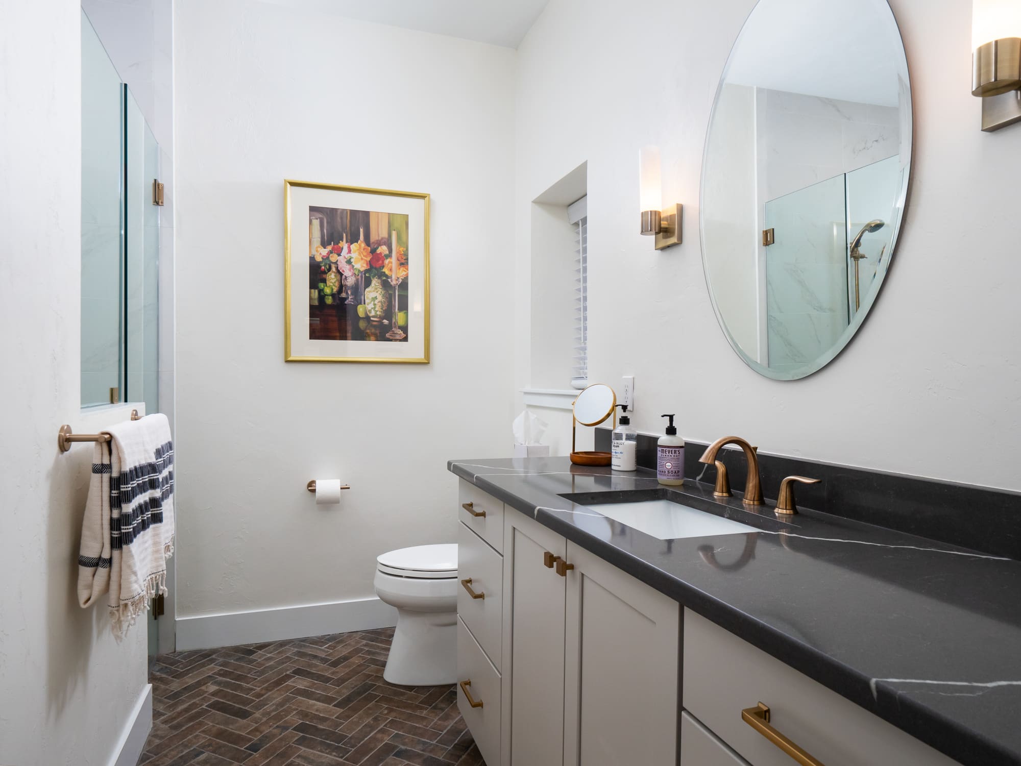 Jonesville adu en suite bathroom with glass shower by robinson renovation