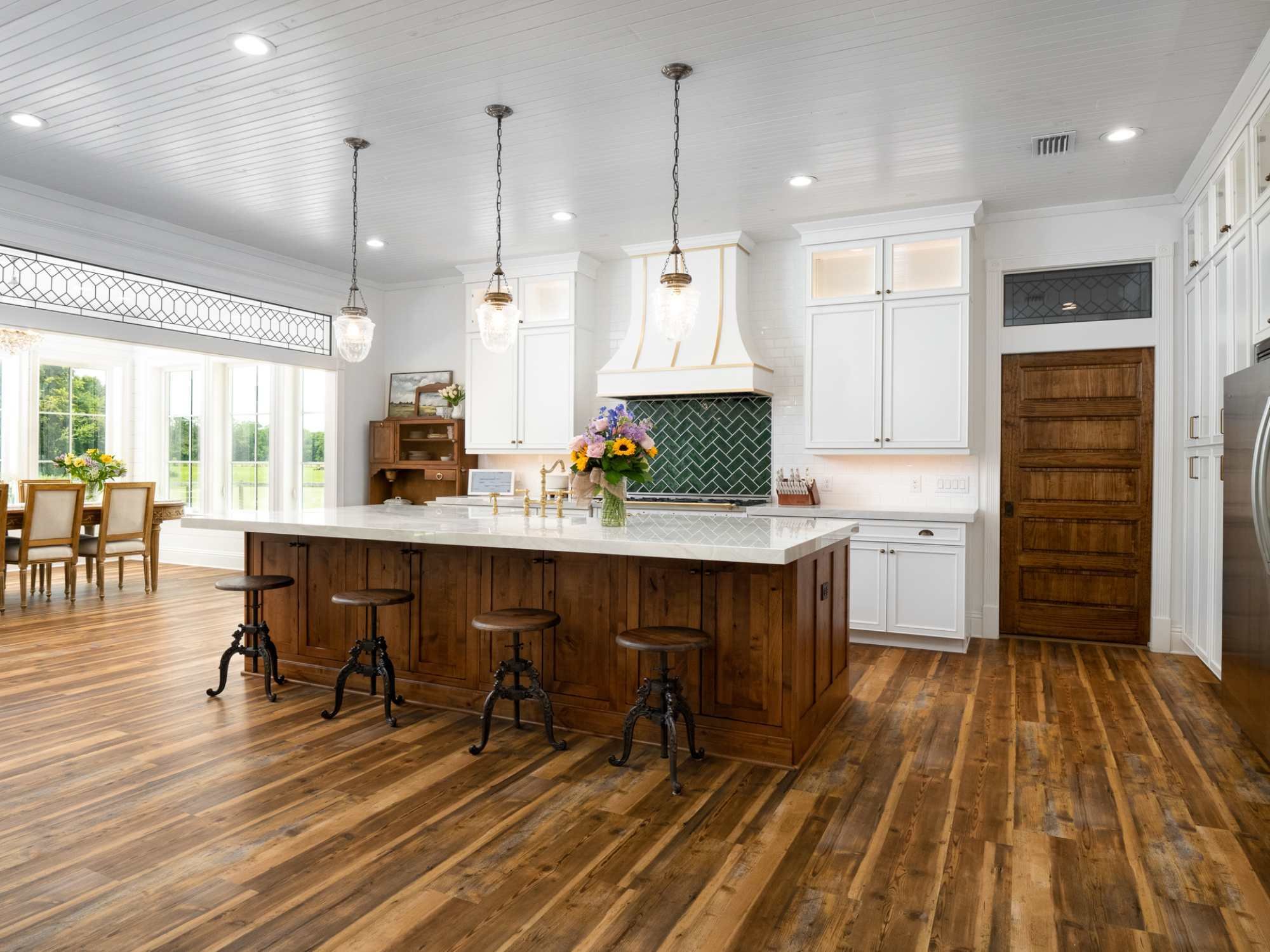Open concept kitchen in a custom home by RRCH in Alachua, FL