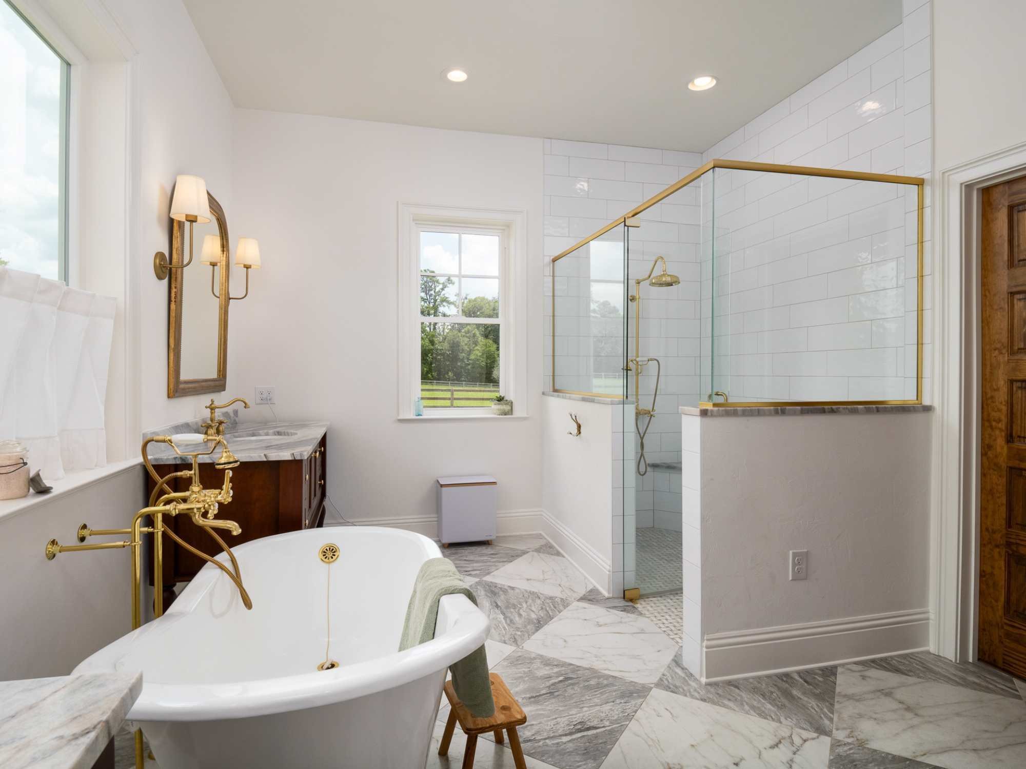 Spacious bathroom with soaking tub in a custom home by RRCH in Alachua, FL