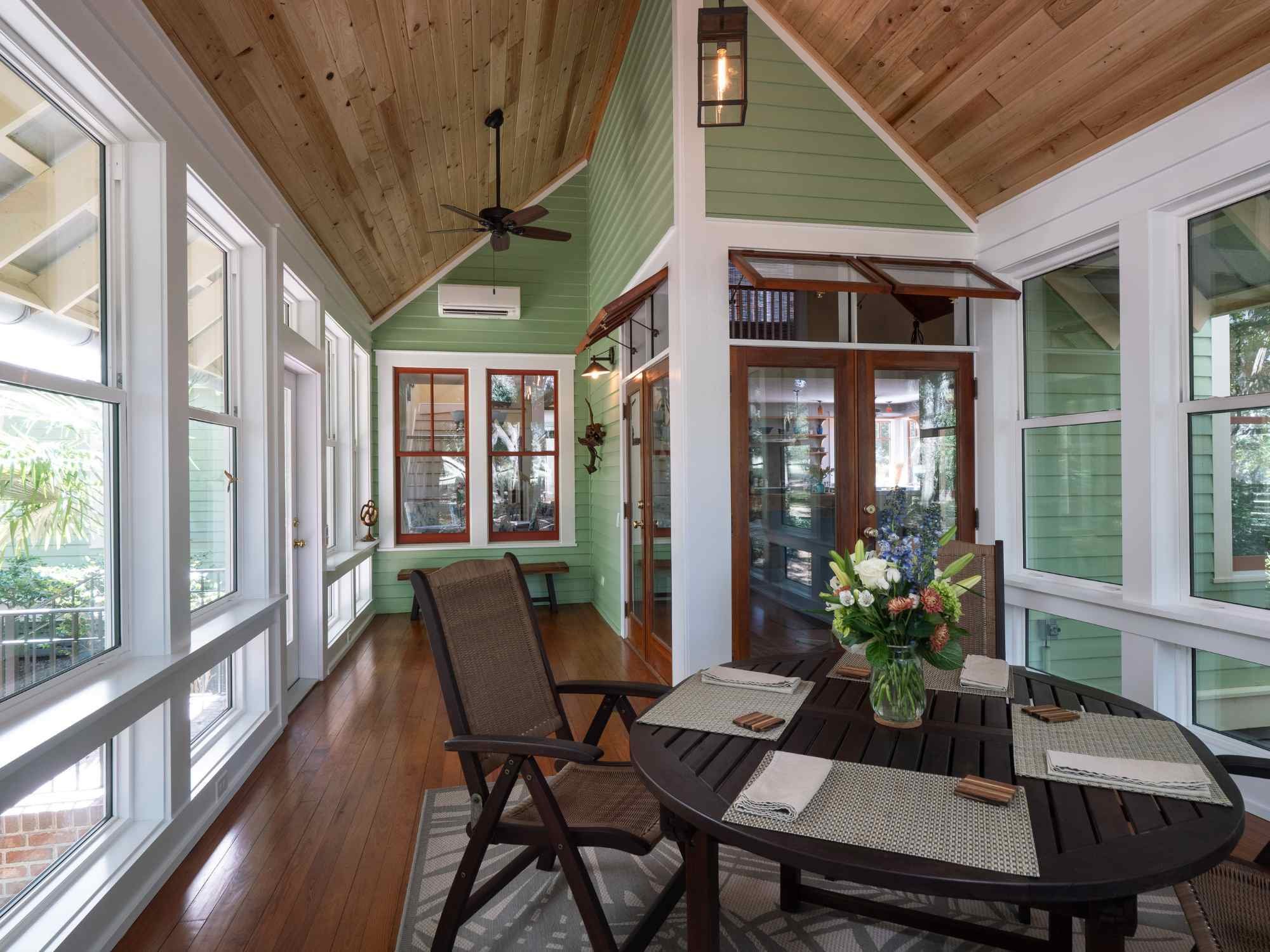 Bright sunroom addition in High Springs, FL by Robinson Renovation and Custom Homes with wood ceiling and natural light Bright sunroom addition in High Springs, FL by Robinson Renovation and Custom Homes with wood ceiling and natural light