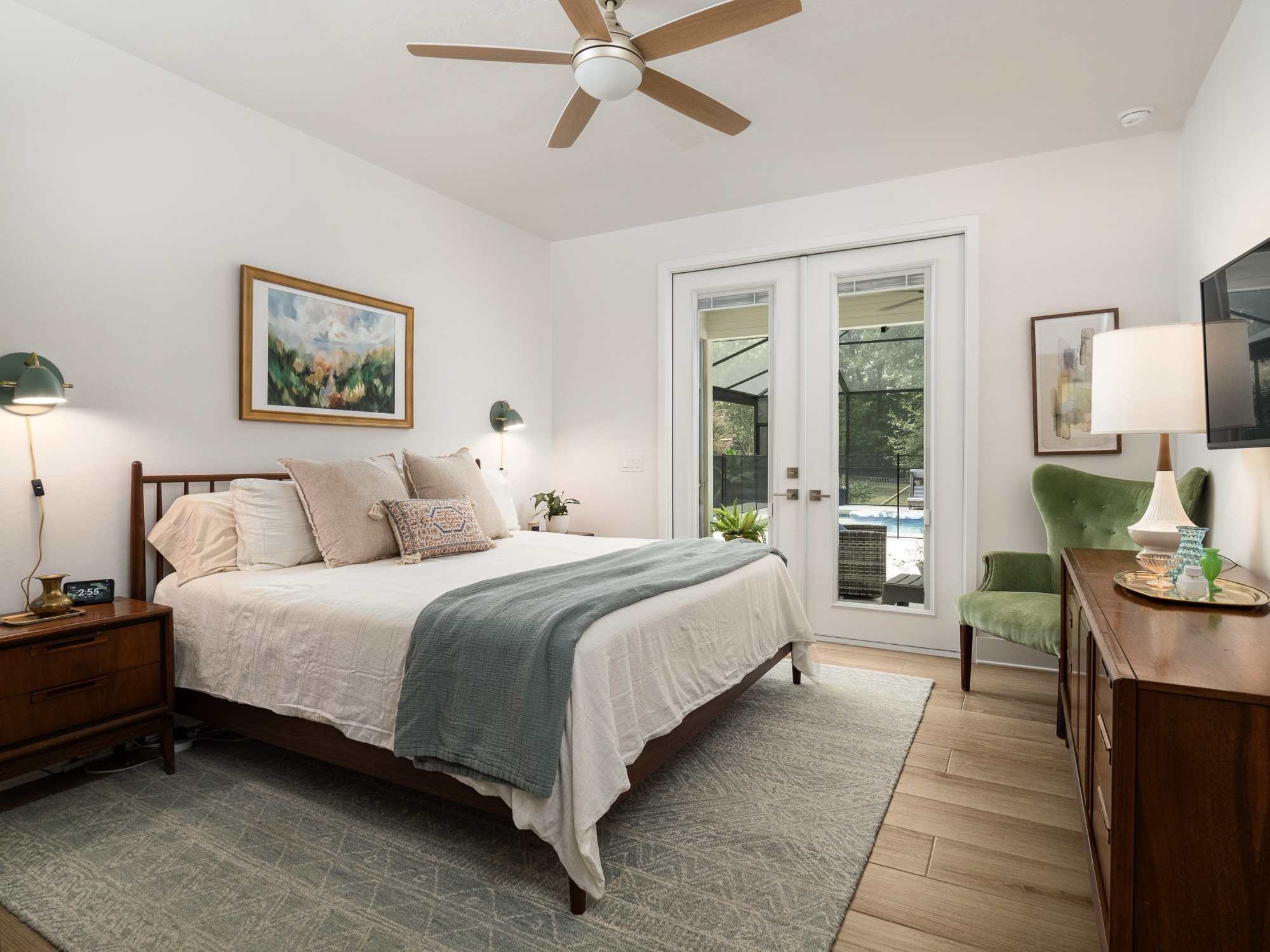 Bedroom with glass doors in an ADU built by RRCH in Alachua County, FL