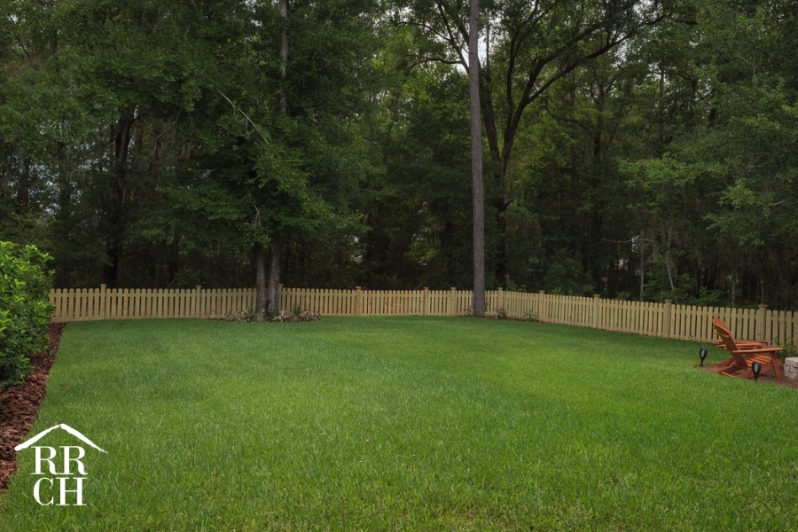 Custom Home Build Longleaf Backyard Landscaping Large Fenced-in Backyard | Robinson Renovation & Custom Homes, Inc.