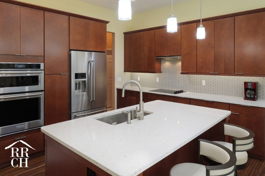 Kitchen Remodel with Contemporary Stools and Eat-In Island and Built-In Appliances | Robinson Renovations and Custom Homes