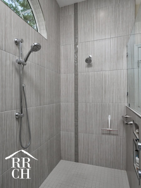 Large Walk-In Shower with Natural Light and Built-In Toiletry Shelving | Robinson Renovations and Custom Homes