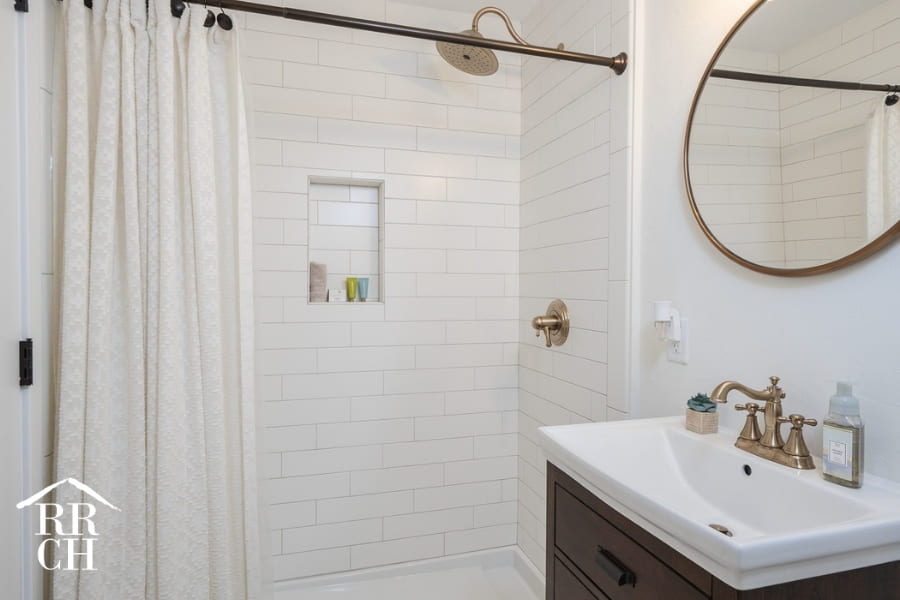 Custom Home Build Extra Bathroom Subway Tile and Accent Mirror - Dylans Grove 2 | Robinson Renovation & Custom Homes, Inc.