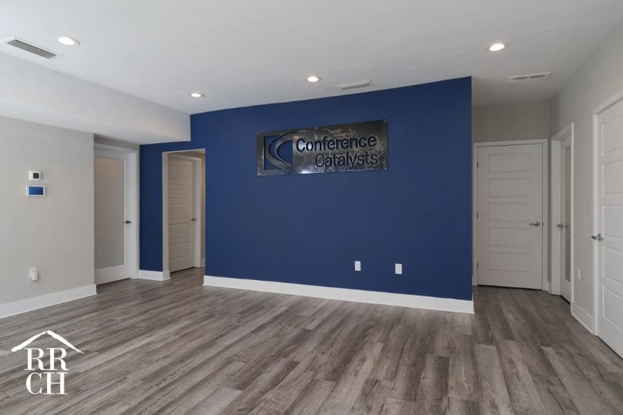 Blue Accent Wall Entryway in Corporate Commercial Office Renovation | Robinson Renovation and Custom Homes